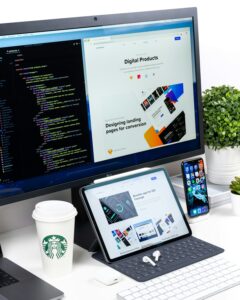 Web designer comparing page builder layouts on screen
